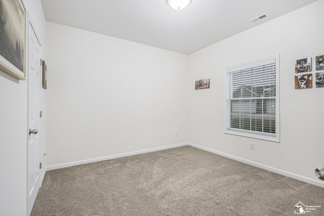 view of carpeted spare room