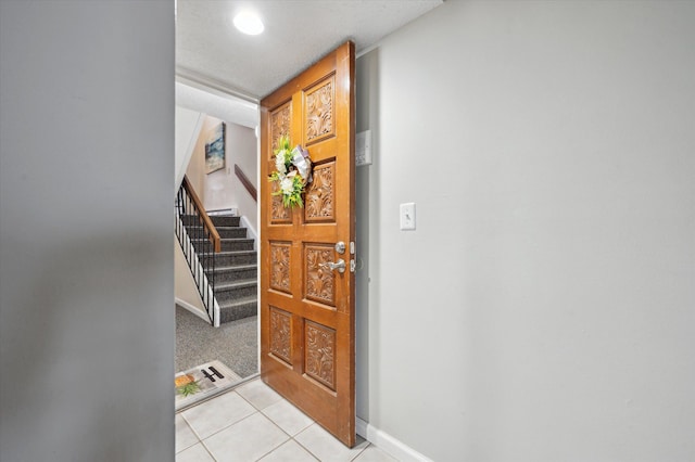 view of tiled entrance foyer