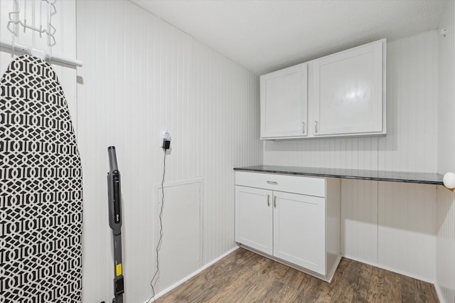 washroom with wood-type flooring