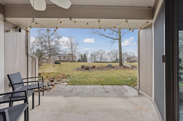 view of patio / terrace featuring ceiling fan