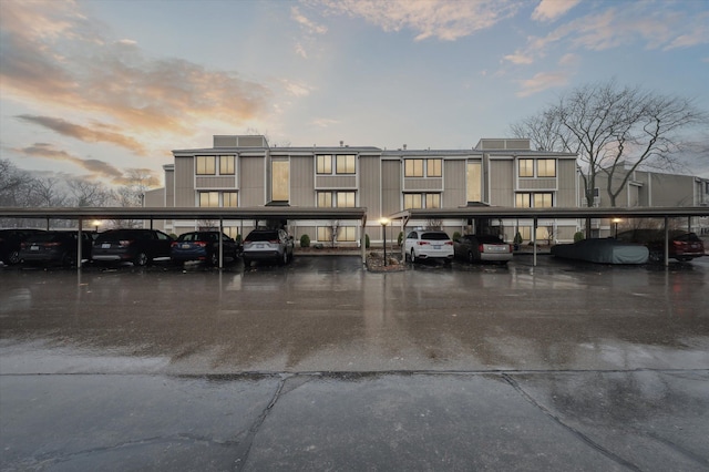 view of outdoor building at dusk