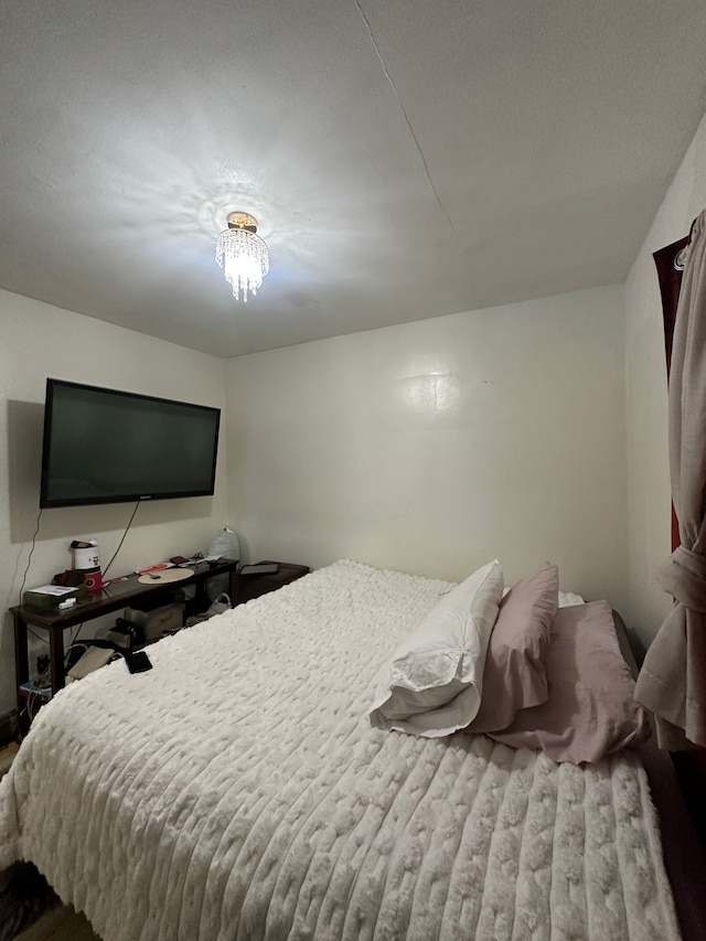 bedroom featuring hardwood / wood-style floors