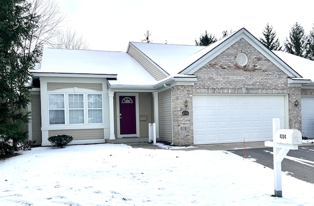 ranch-style house featuring a garage