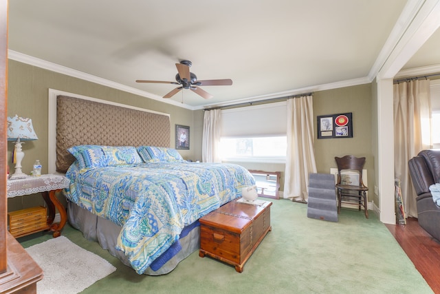 bedroom featuring ornamental molding and ceiling fan