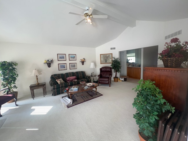 carpeted living room with ceiling fan, high vaulted ceiling, beamed ceiling, and visible vents