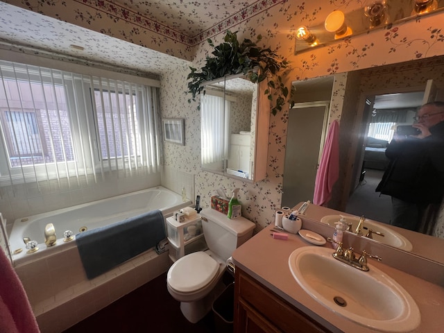 full bathroom featuring wallpapered walls, toilet, vanity, a shower stall, and a bath