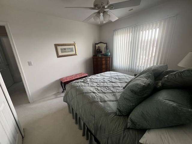 bedroom featuring carpet floors and a ceiling fan