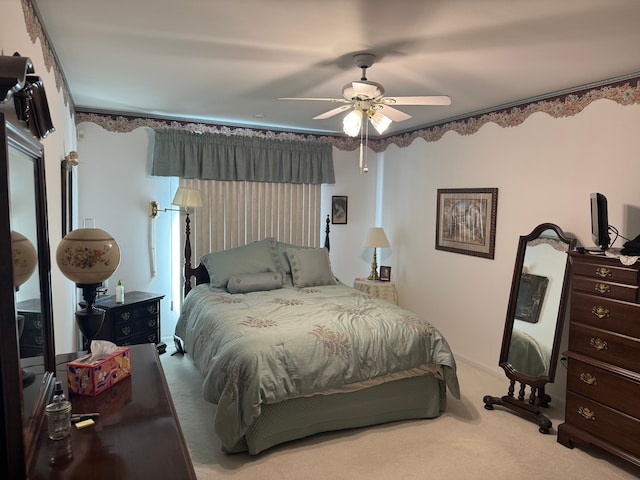 bedroom featuring carpet floors and a ceiling fan