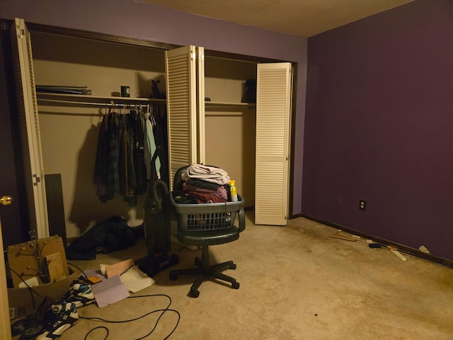 bedroom with light colored carpet