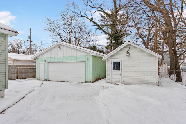 view of snow covered garage