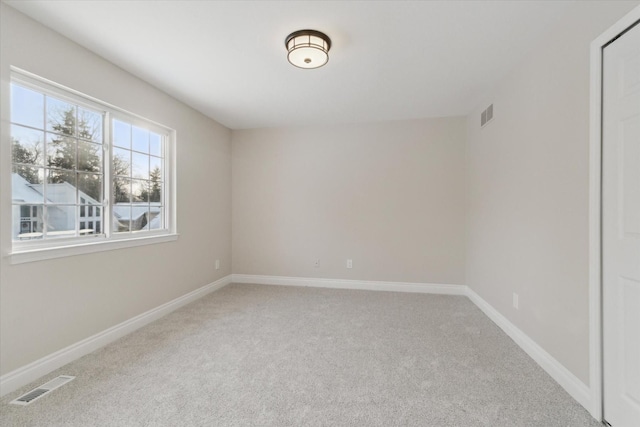 empty room with carpet flooring