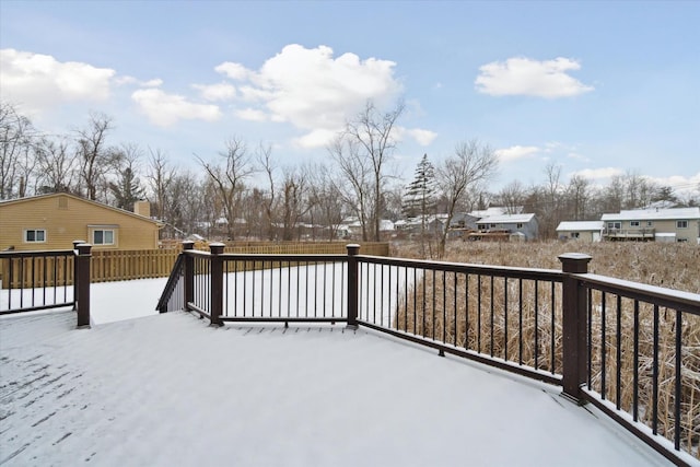 view of snow covered deck