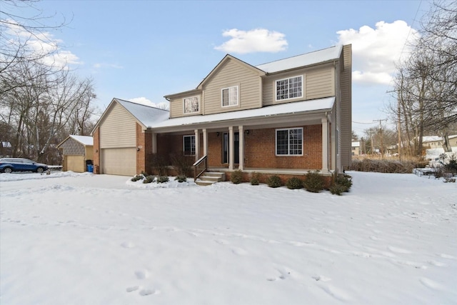 view of front facade featuring a garage and a porch