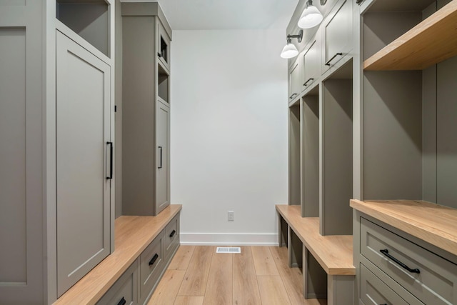 mudroom with light wood-type flooring