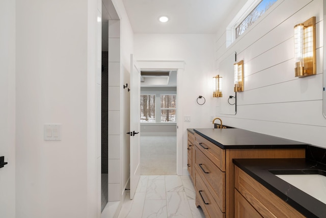 bathroom with a wealth of natural light and vanity