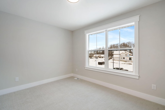 view of carpeted spare room