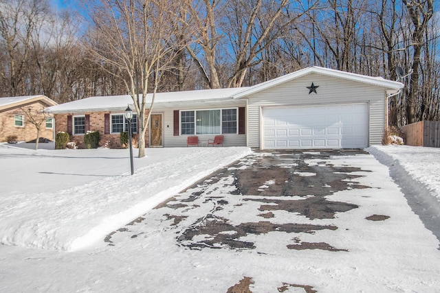 single story home with a garage