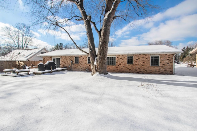 view of snow covered property