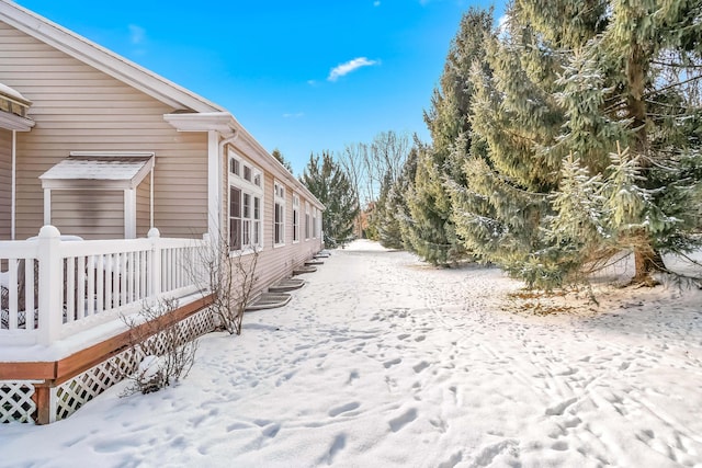 view of yard covered in snow