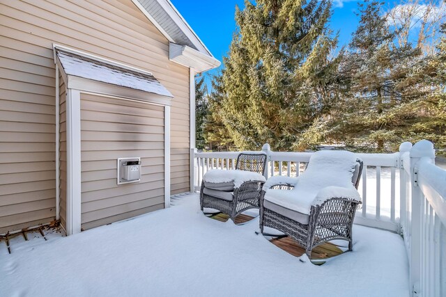 view of snow covered deck