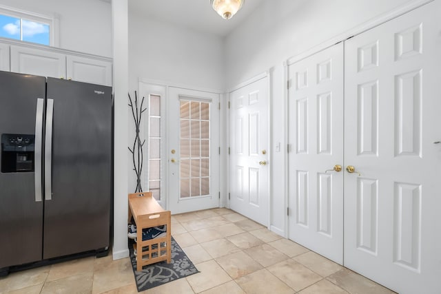 interior space featuring light tile patterned floors