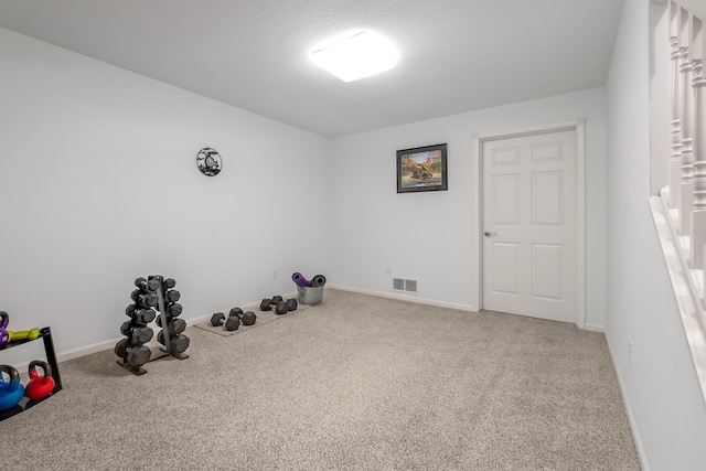 workout room with carpet flooring