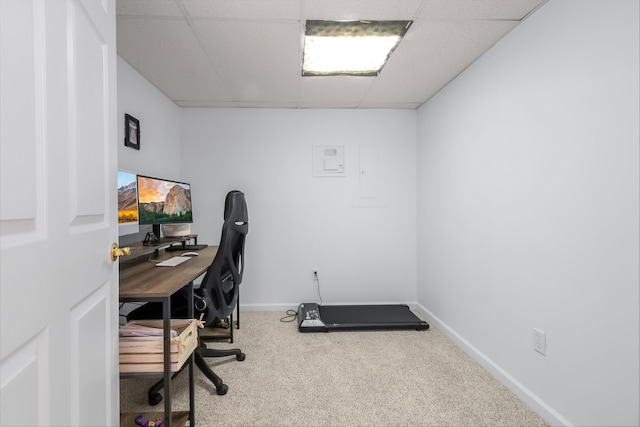 home office featuring a drop ceiling and carpet flooring