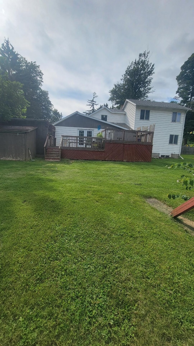 view of yard with a deck