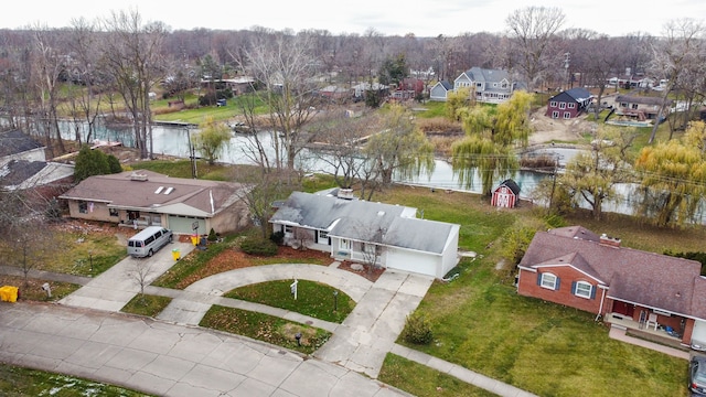 bird's eye view with a water view