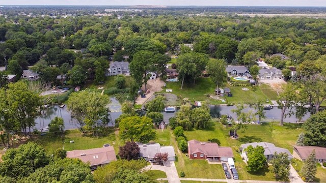 21918 Knudsen Dr, Grosse Ile, MI 48138 - aerial view of property's location with a nearby body of water and nearby suburban area
