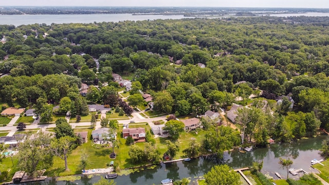 21918 Knudsen Dr, Grosse Ile, MI 48138 - view of property location with a nearby body of water, nearby suburban area, and a heavily wooded area