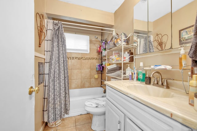 full bathroom with toilet, vanity, tile patterned flooring, and shower / tub combo