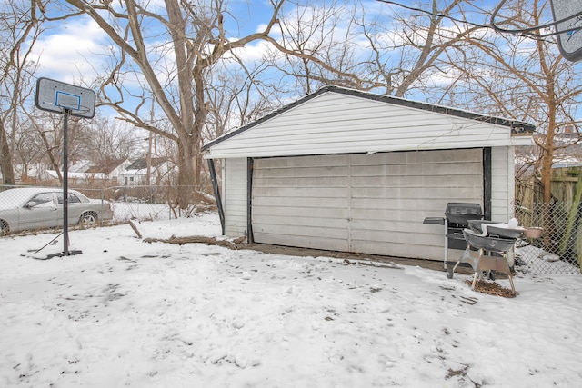 view of snow covered garage