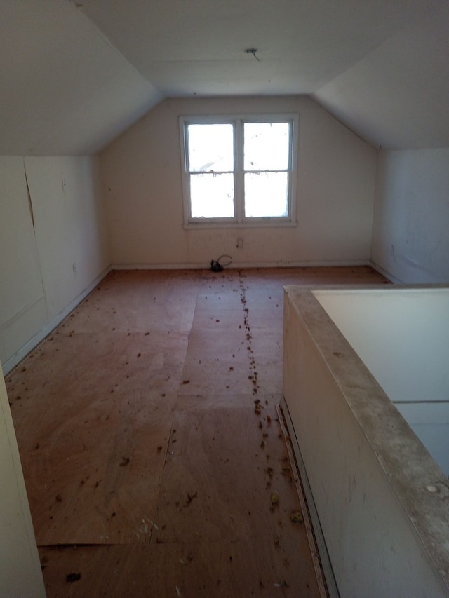 bonus room with vaulted ceiling