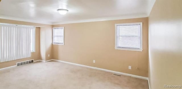 view of carpeted spare room