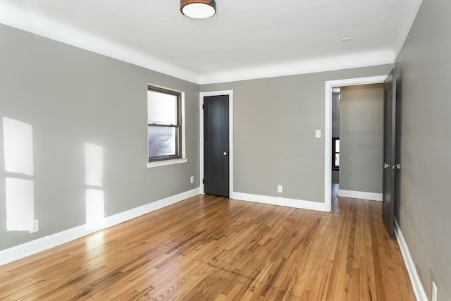 spare room featuring hardwood / wood-style floors