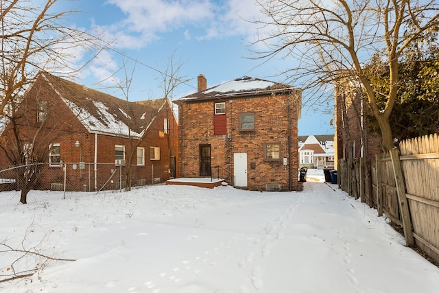 view of snow covered property