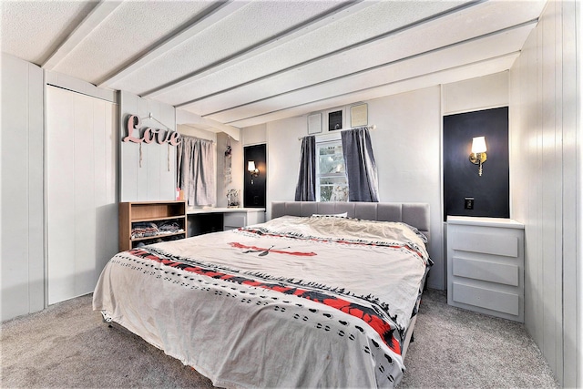 carpeted bedroom with wooden walls