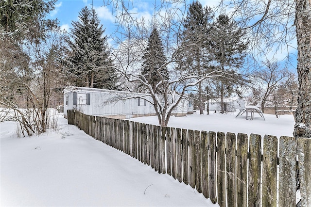 view of yard covered in snow