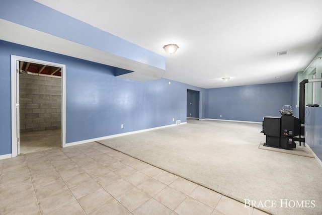 basement featuring carpet flooring