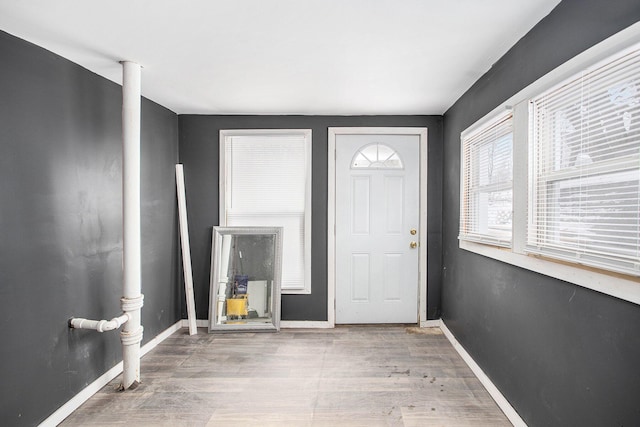 entrance foyer featuring hardwood / wood-style flooring