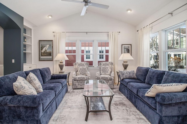 5 Georgia Ct, Pentwater, MI 49449 - living room with lofted ceiling, ceiling fan, and built in features