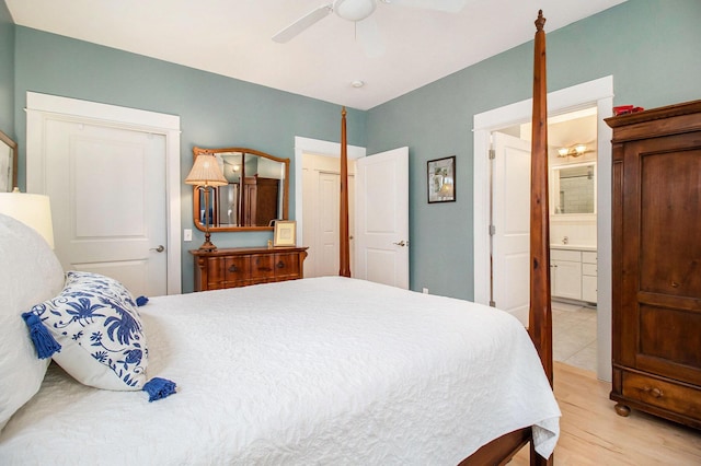 5 Georgia Ct, Pentwater, MI 49449 - bedroom featuring connected bathroom and ceiling fan
