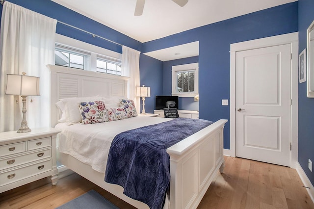 5 Georgia Ct, Pentwater, MI 49449 - bedroom featuring ceiling fan, light wood-type flooring, and baseboards