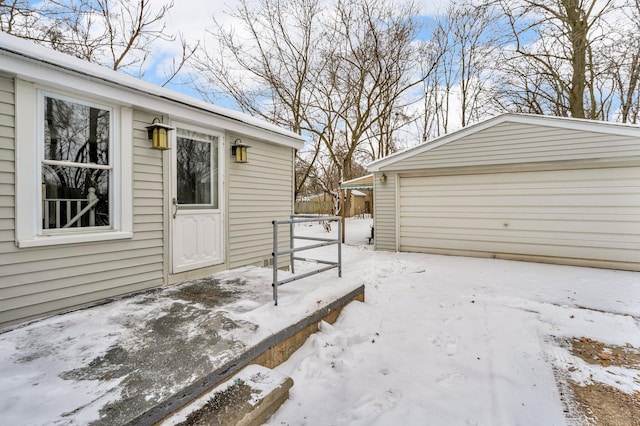 view of snow covered garage