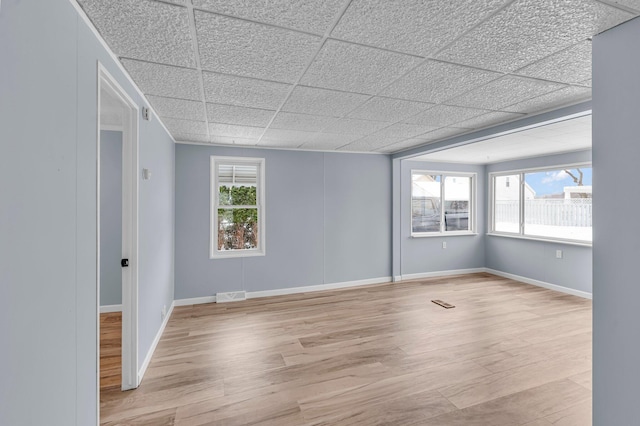 unfurnished room featuring light hardwood / wood-style flooring