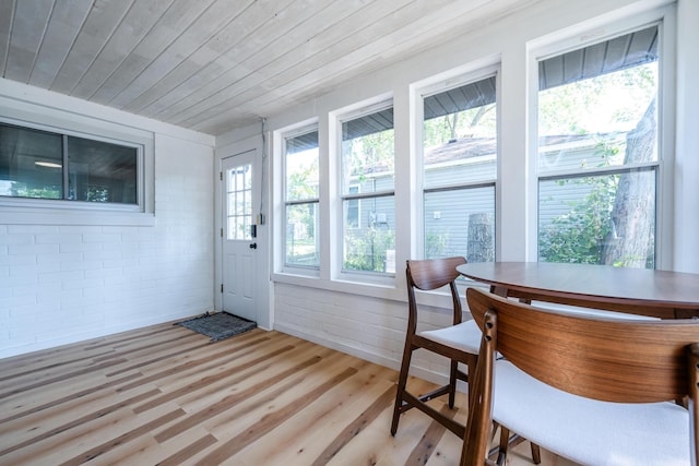 sunroom / solarium with wood ceiling