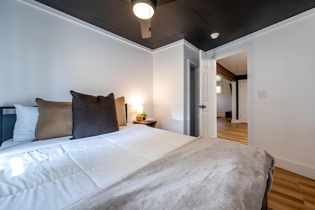 bedroom with hardwood / wood-style flooring