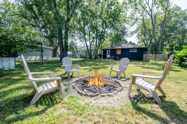 view of yard featuring a fire pit