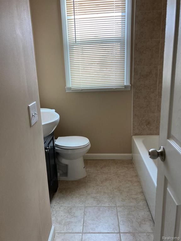 bathroom with toilet and sink